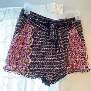 Black floral print shorts